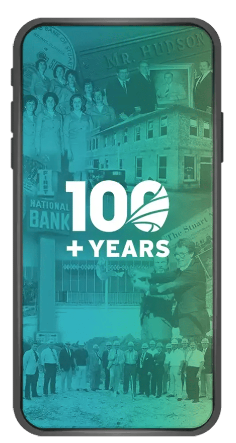 Smartphone mockup displaying a collage of historic Seacoast Bank photos with a ‘100+ Years’ milestone graphic.