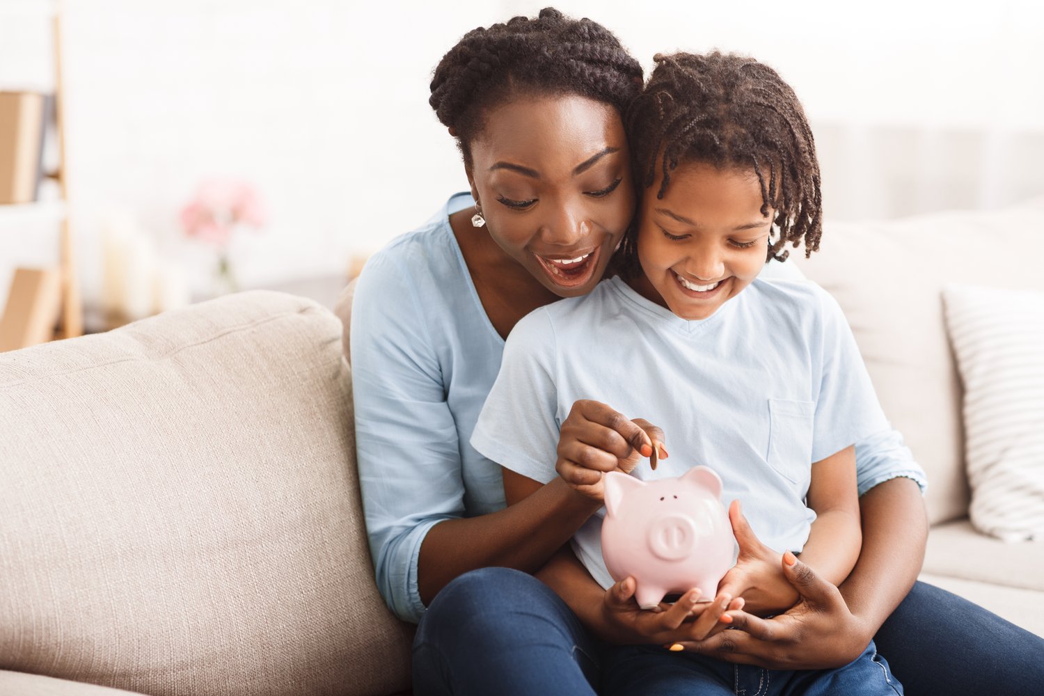 Mom teaching savings to child