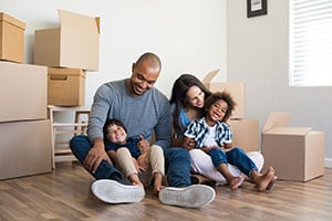 family with moving boxes