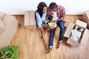 couple choosing paint samples in their new home