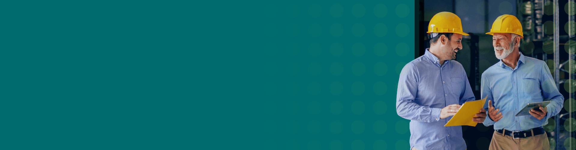 Men wearing hardhats walking in a warehouse