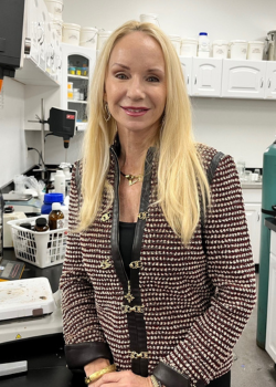 Deborah Duffey stands in a Dermazone Solutions R&D lab