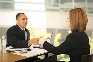 woman successfully applying for a business loan