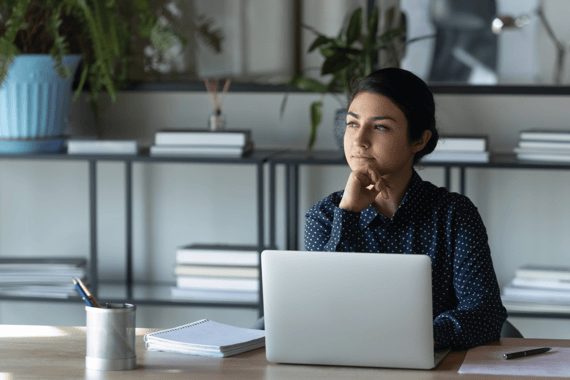 Woman working on laptop in office