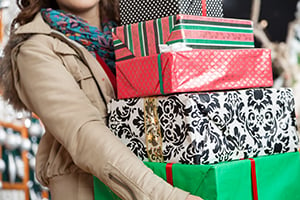 woman holding presents