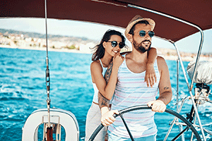 smiling couple on a boat