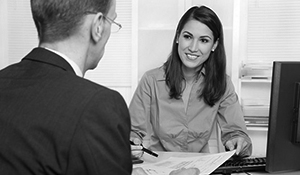 man and woman discussing business banking